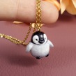 Penguin Necklace in Polymer Clay. Fine Arts, Jewelr, Design, and Sculpture project by Marisa Clemente - 12.02.2019