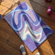Purple Swirl Teppich. Un proyecto de Diseño, Diseño gráfico, Diseño de interiores, Diseño de producto y Diseño textil de Zeyu Cheng - 09.03.2022