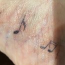 Music notes on my foot  Ein Projekt aus dem Bereich Tattoodesign von Yuk ting Hui - 19.09.2021