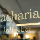 Window gilding for Zacharias Kaffeebar. Br, ing, Identit, Arts, Crafts, Fine Arts, H, Lettering, and Spatial Design project by Elena Albertoni - 04.11.2022