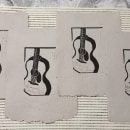 Lino print of a guitar on a handmade paper. Paper Craft, and Printing project by Aleksandra Aprilova - 01.26.2023