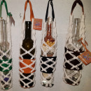 botellas con cuero y macrame. Un progetto di Design e Macramè di gabriela cozzani - 05.11.2023