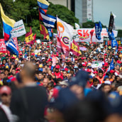 Marcha a favor de medidas económicas del gobierno de Nicolás Maduro en Caracas. Un proyecto de Fotografía de salgado_marcos - 21.08.2018