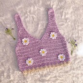 Crochet Daisy Vest . Un progetto di Uncinetto di Lucero Grullón - 05.05.2021