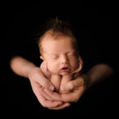Baby in Parents Hands . Photograph project by Lidi Lima-Conlon - 03.12.2022