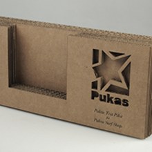 Porta postales PUKAS. Un projet de Publicité de Gorka Lopez Eguzkiza - 05.02.2014