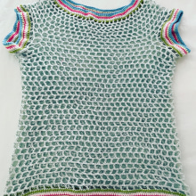 T-shirt top-down circular. Un proyecto de Crochet de sandrabatista25 - 13.08.2022