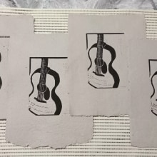 Lino print of a guitar on a handmade paper. Un proyecto de Papercraft y Estampación de Aleksandra Aprilova - 26.01.2023