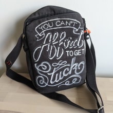 "You Can't Afford to Get Stuck" Hand-Lettered Purse. Fashion, Lettering, H, and Lettering project by Liz - 06.10.2023