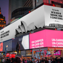 Visit Australia, a climate action billboard in Times Square, NY.. Design, T, pograph, Cop, writing, Street Art, Signage Design, and Poster Design project by Seán Marsh - 09.15.2021