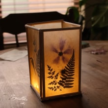 Teabag floral lantern. Un proyecto de Artesanía de Sibia Torres Padilla - 01.02.2024