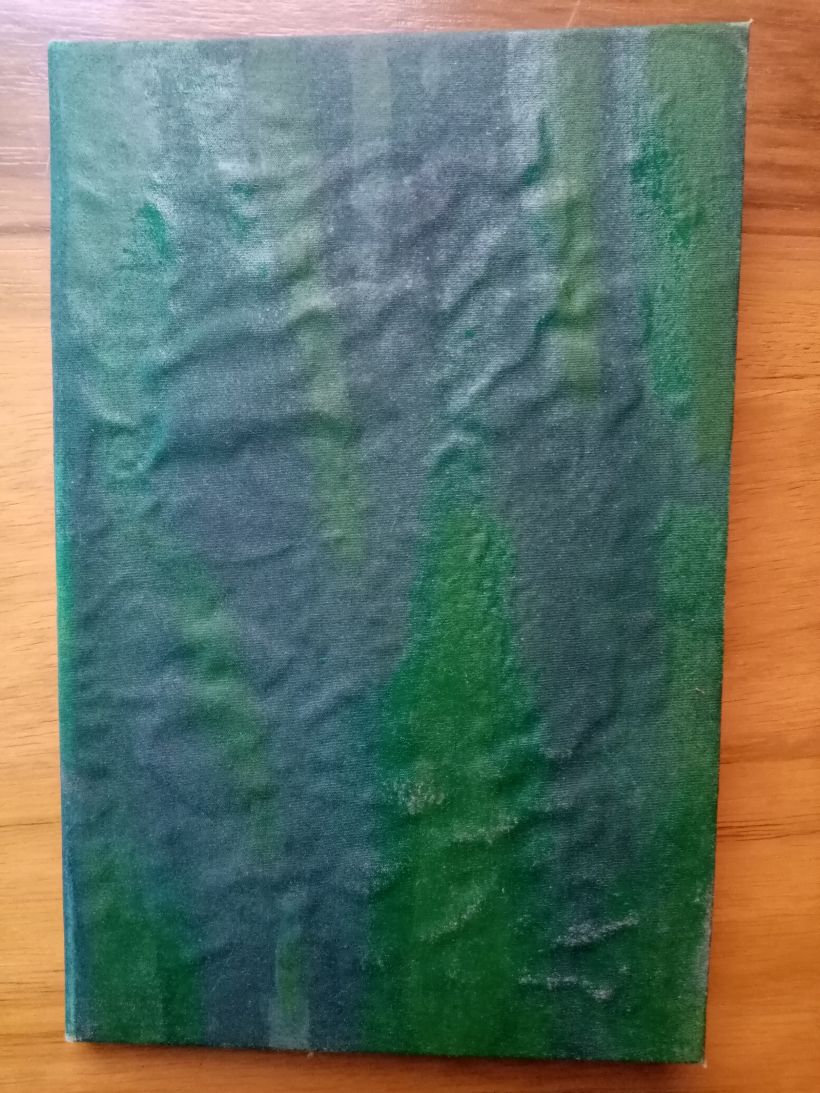 Libro de artista con tela impermeable de taslam engomado