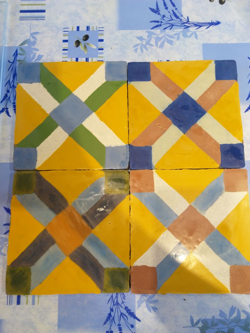My first four tiles. Trued different colours combinations!
