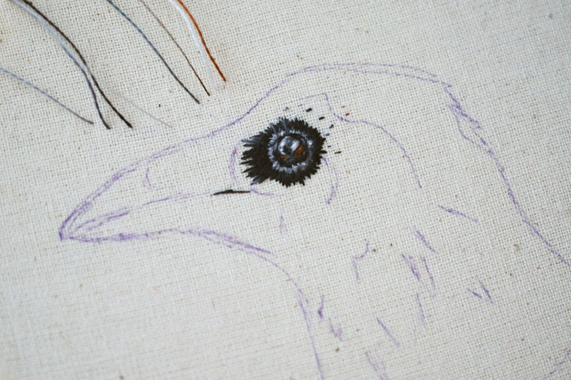 First stitches - you can see all the colors I used to embroider the eye in the left corner of the image. 