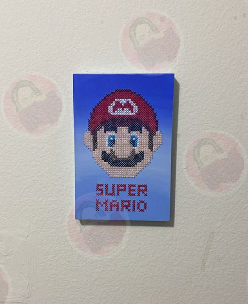 Super Mario bordado en punto de cruz sobre Madera