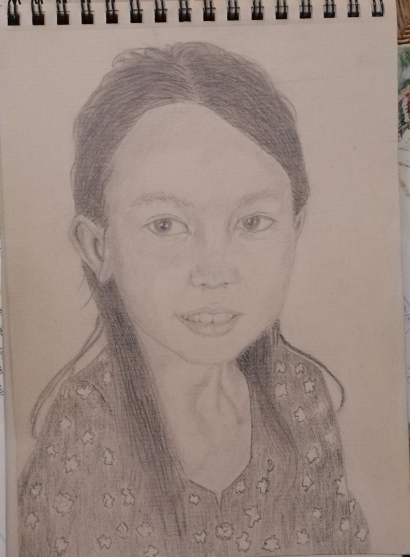 Mon projet du cours : Portrait réaliste au crayon graphite 2