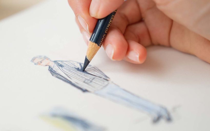 Adding details with a sharp indigo pencil.