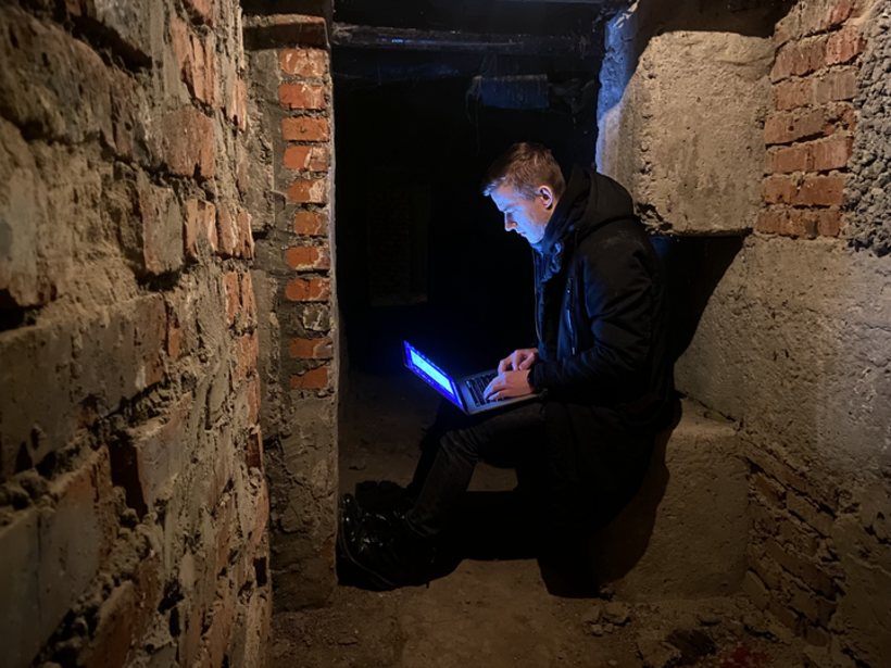 Oleh working from a bomb shelter.