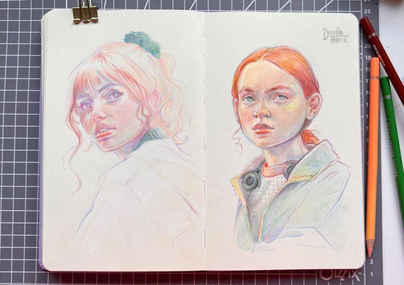 It is very difficult to take a good photo of my colored pencil portraits. I like to scan them to show their true tones.