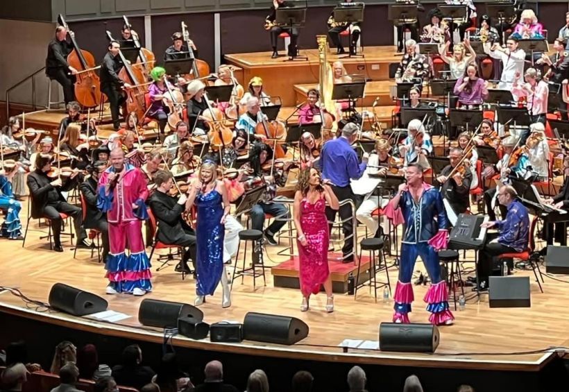 There's nothing quite like singing with an orchestra...in 6 inch boots! Especially when they dress up too.