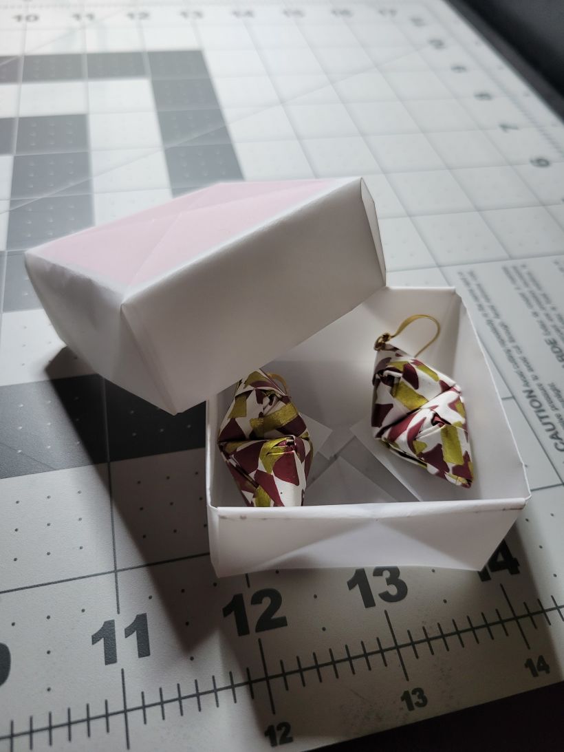 I constructed the origami box to hold the earrings in, and placed the small color card in the box's top.