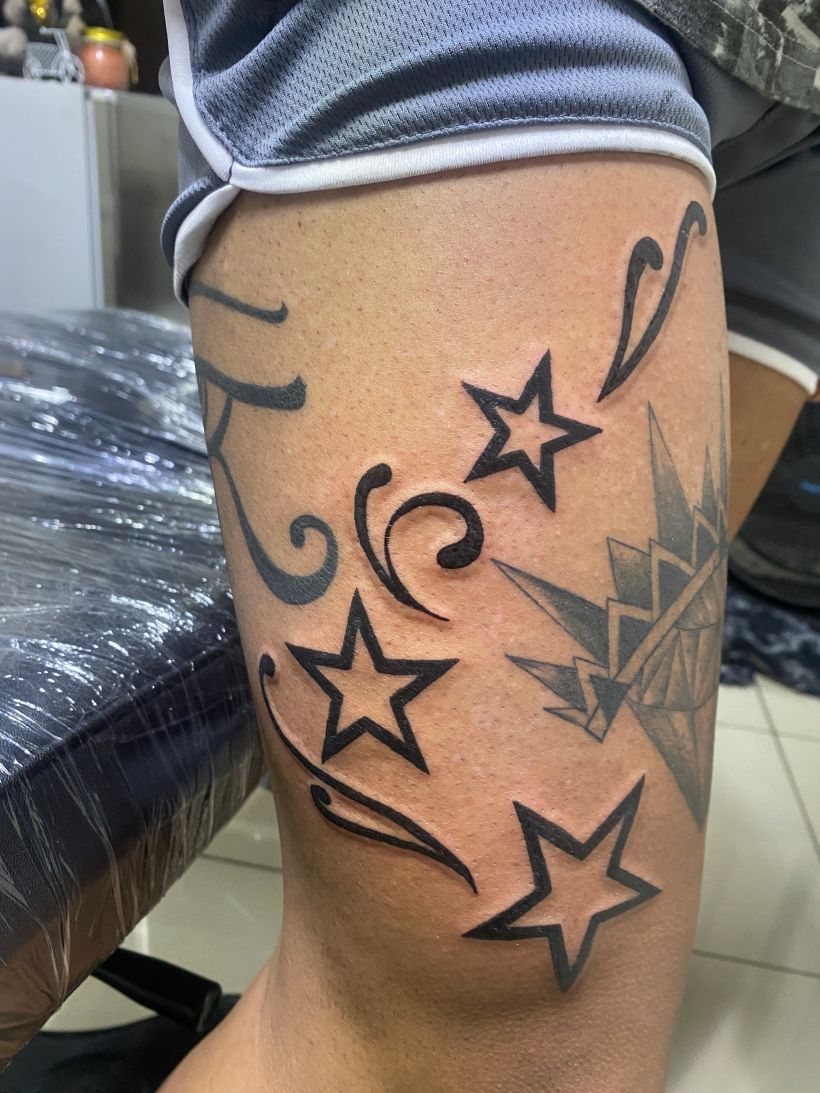 Star wounded by dagger tattoo idea | TattoosAI