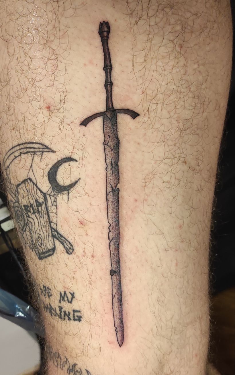 A pirate sword in American traditional style for a forearm tattoo idea |  TattoosAI