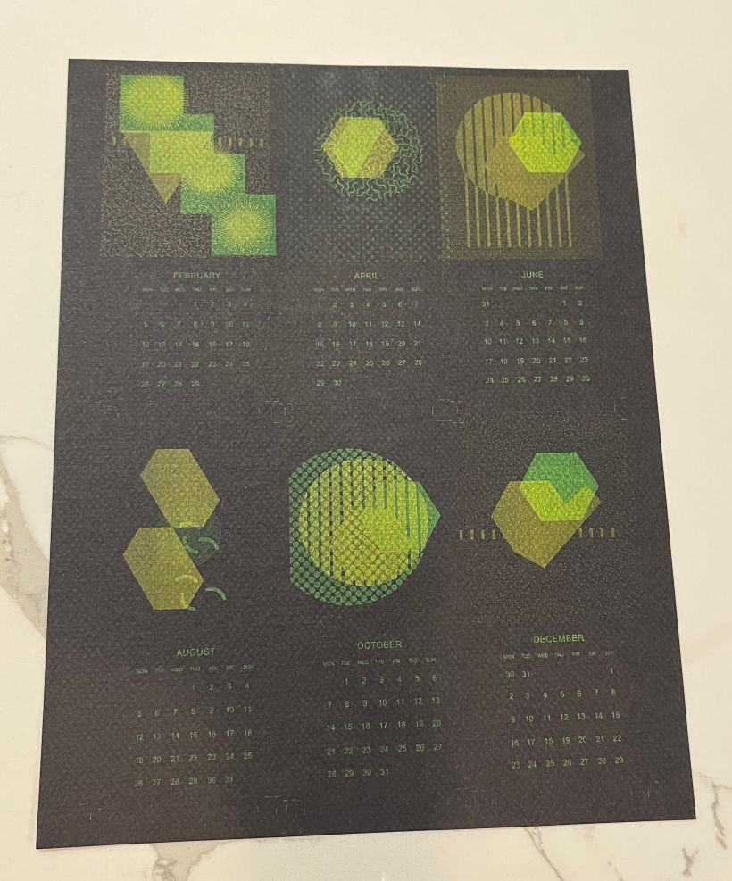 Printout on black card. Yellow on orange. The yellow ended up green when laid on top of black card.