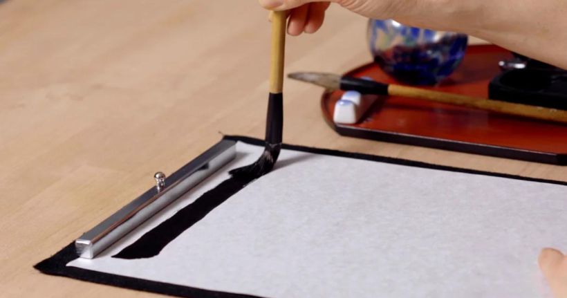 Slide your brush over the paper carefully.