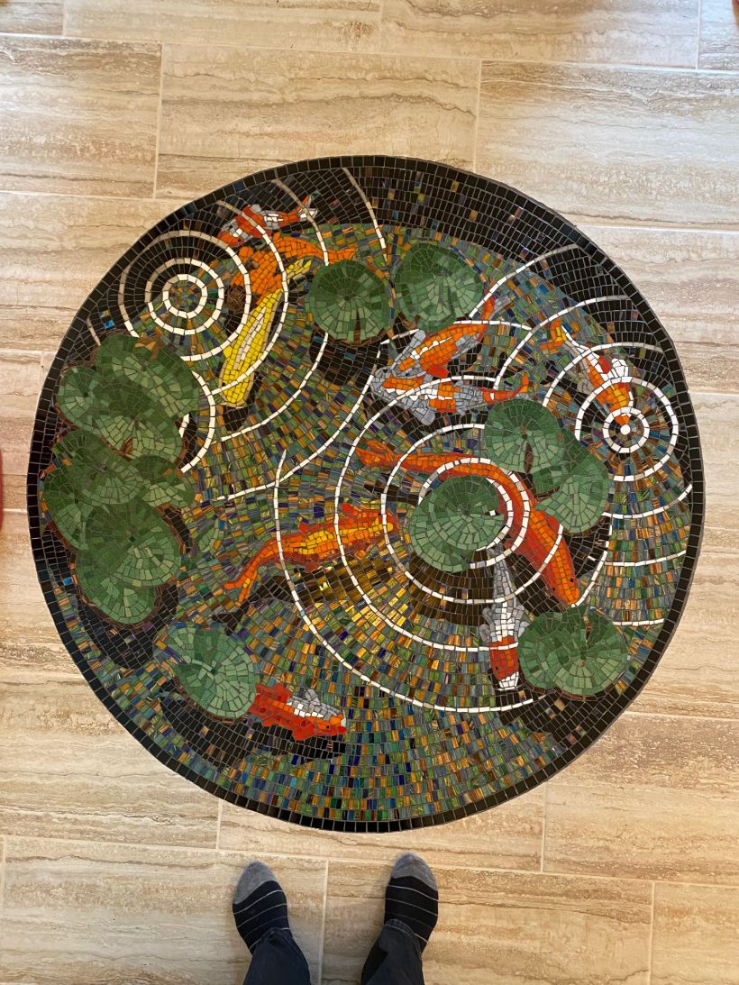 The finally finished mosaic --  turned out looking great.  Finished diameter is 52".