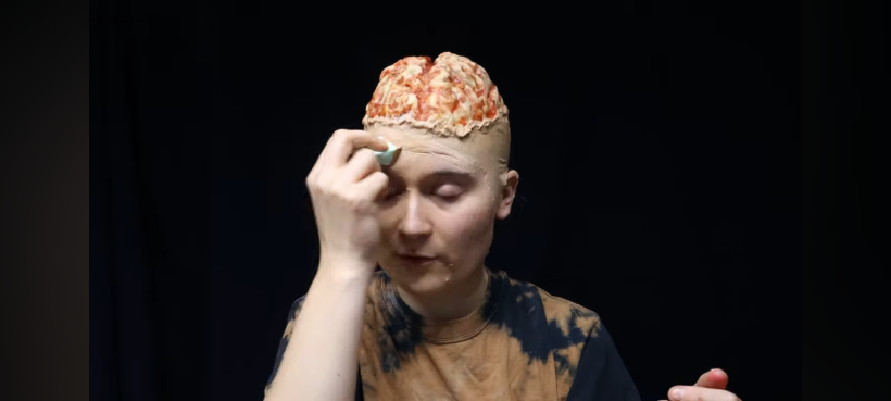 Adding a lip to the fake brain to make it look like it is coming out of head.