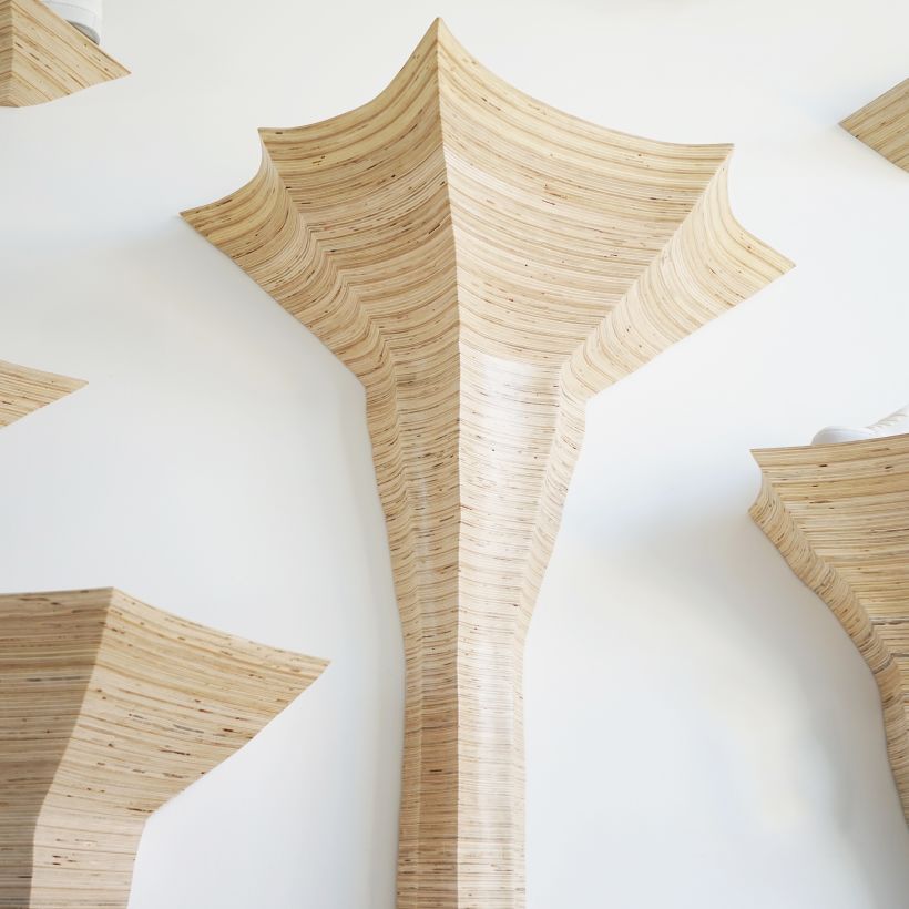 plywood can be glued into large blocks and then power carved into organic shapes