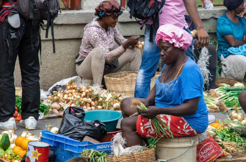 a trader in a common market in Port-au-Prince, Haiti, March 04, 2024. (Photo/Pierre Marckinson)