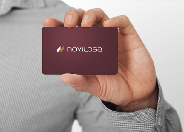 Logotipo para Novilosa, una empresa fabricante de pavimentos y revestimientos cerámicos para multitud de aplicaciones como viviendas, exteriores, piscinas, construcciones industriales, etc... 1