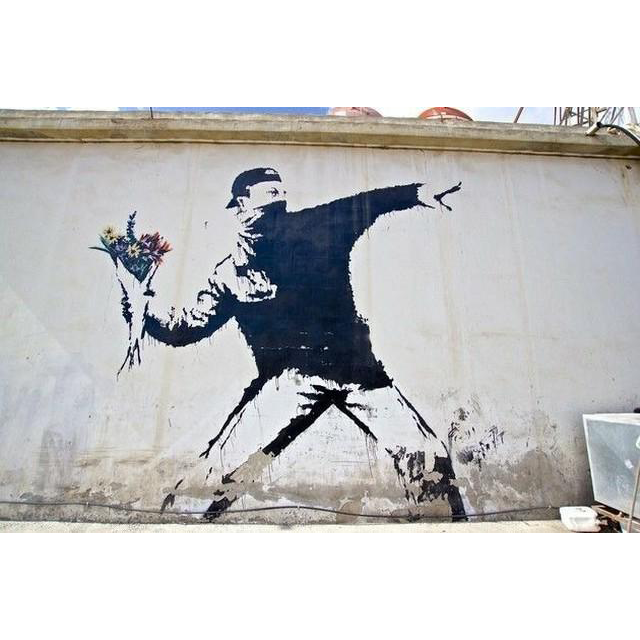 Graffiti: "Soldado lanzando flores" Banksy